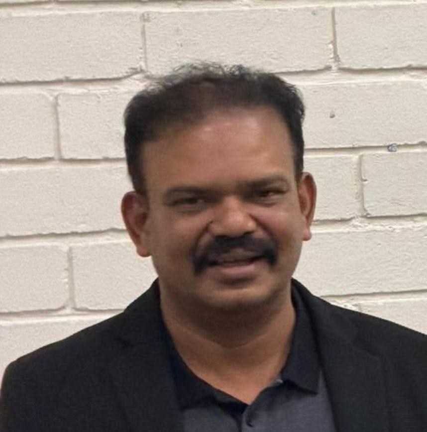 Anil K Komma